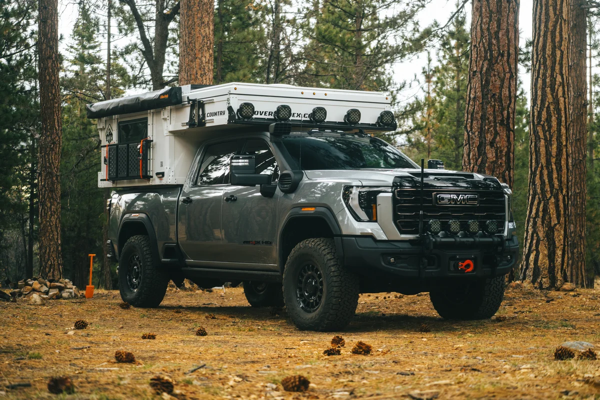 Back Country 6.85 landscape front three-quarter with pop-up roof open, driver side rear quarter visible