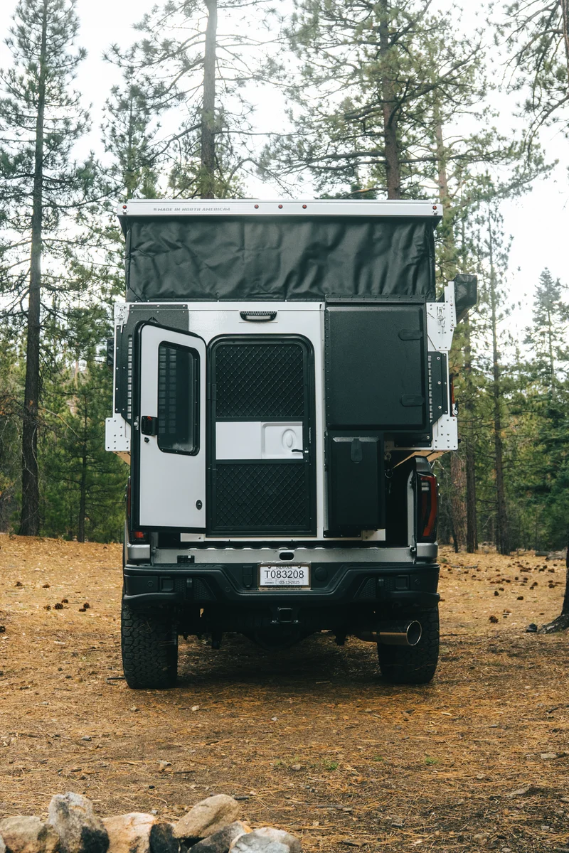 Back Country 6.85 rear straight portrait with pop-up fully raised and entry door open