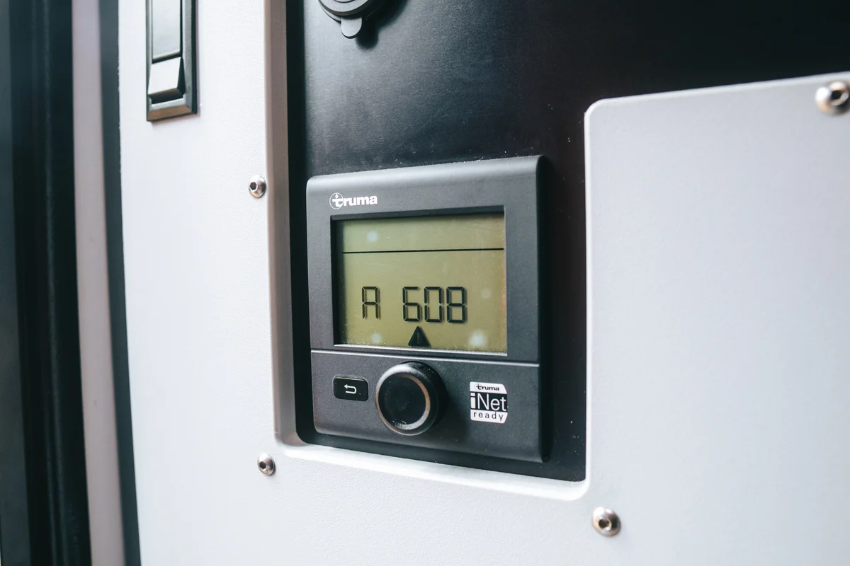 Back Country 6.85 Truma iNet thermostat close-up mounted on interior wall panel